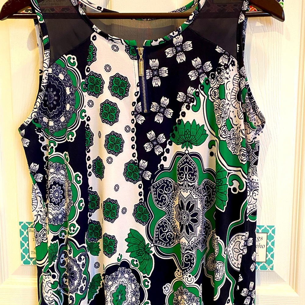 Medium casual dressy tank. Navy and white with a pops of green